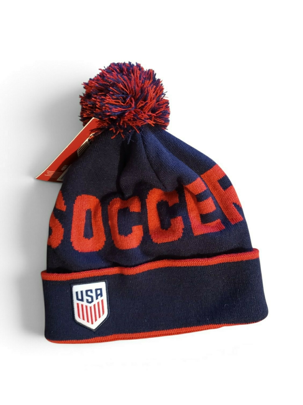 Icon Sports U.S. Soccer beanie navy blue knit body with "SOCCER" in text.